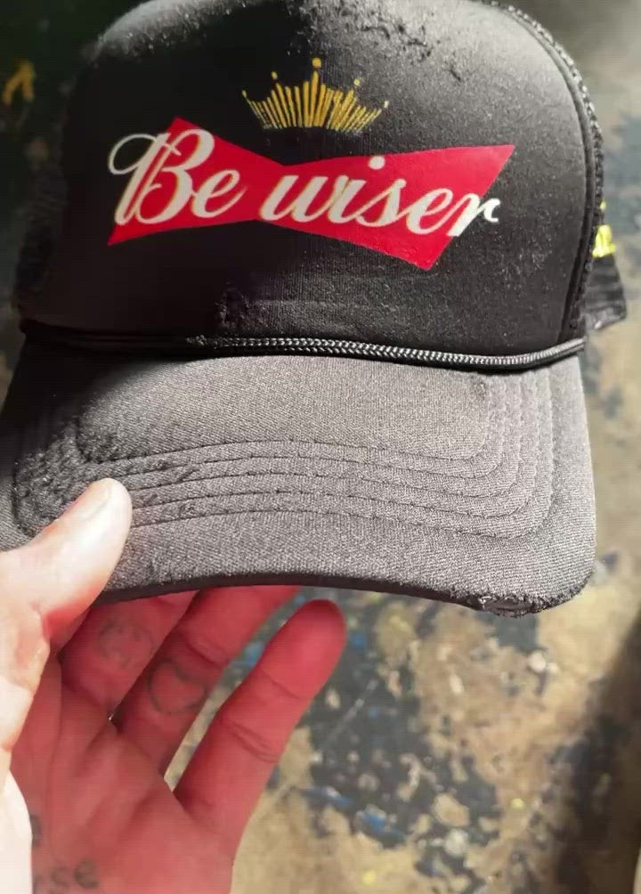 WI: "Be Wiser" Logo Trucker Hat